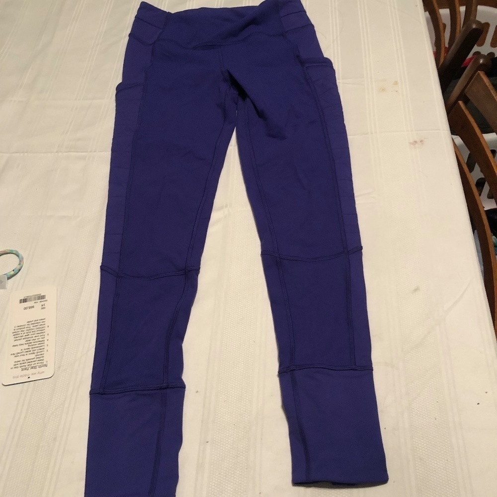Ivivva. BY lulu lemon size 14 North Star purple pants. Pockets, hidden pocket.